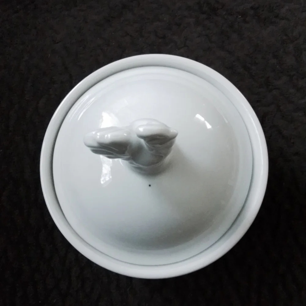 White ramekin with rooster lid